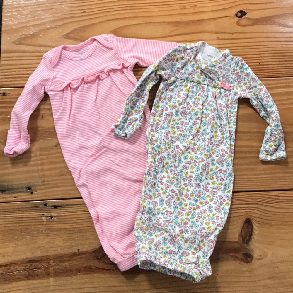 2 Newborn sleep outfits.